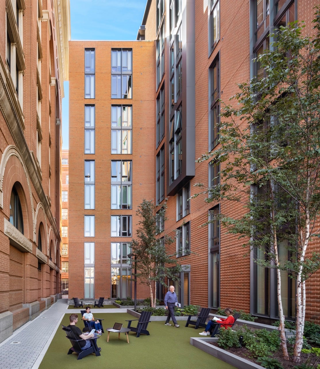 apartment courtyard with Adirondack chairs