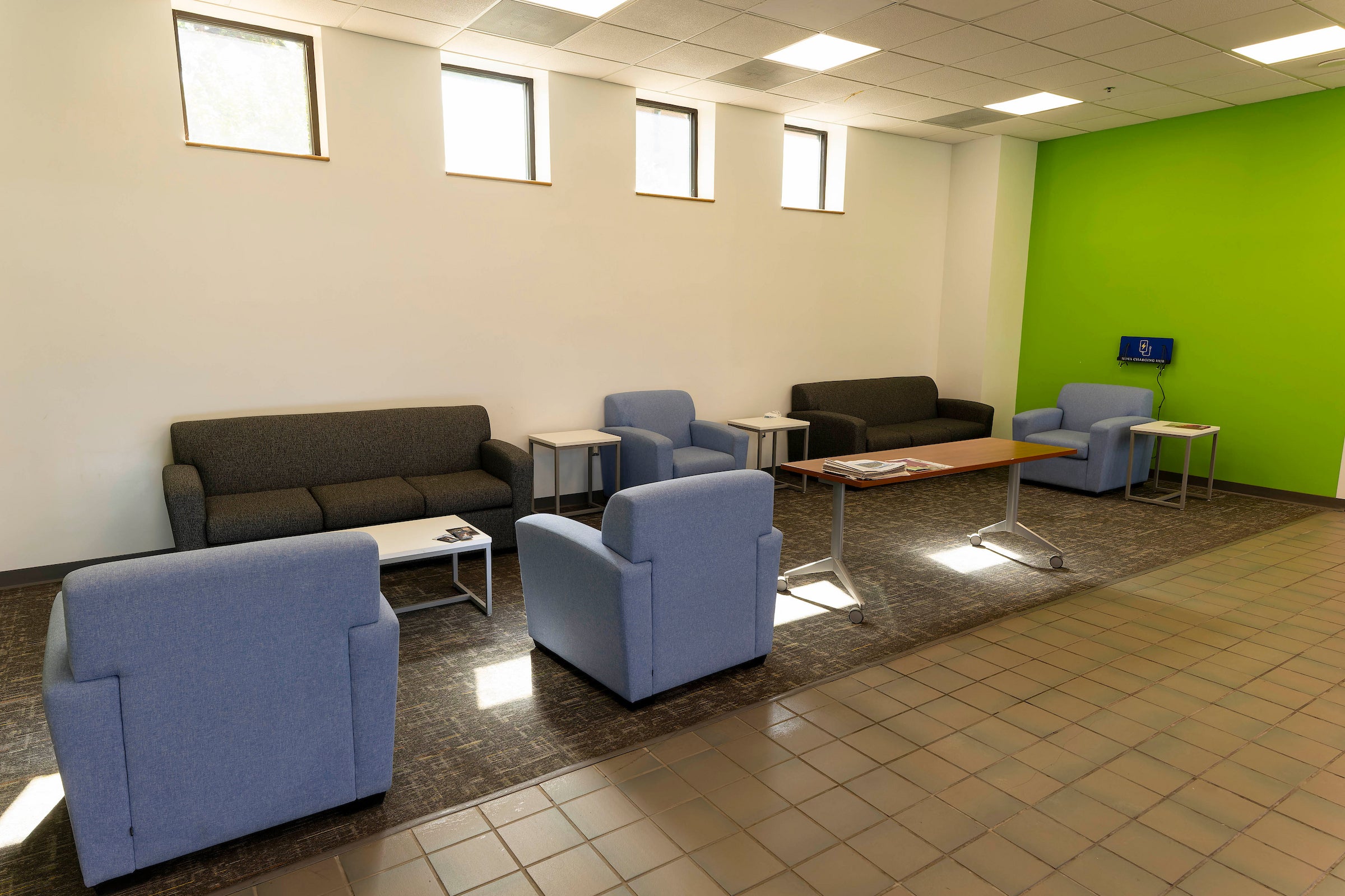 Darnall interior lobby showing a bright green wall and comfortable chairs