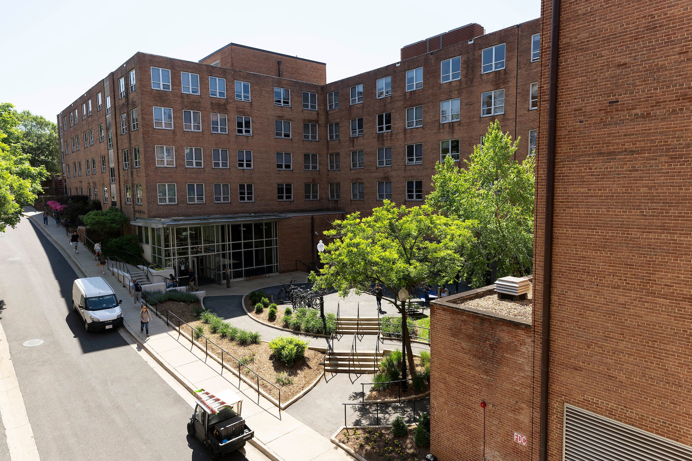Exterior view of New South, a brick building on a sloped hill
