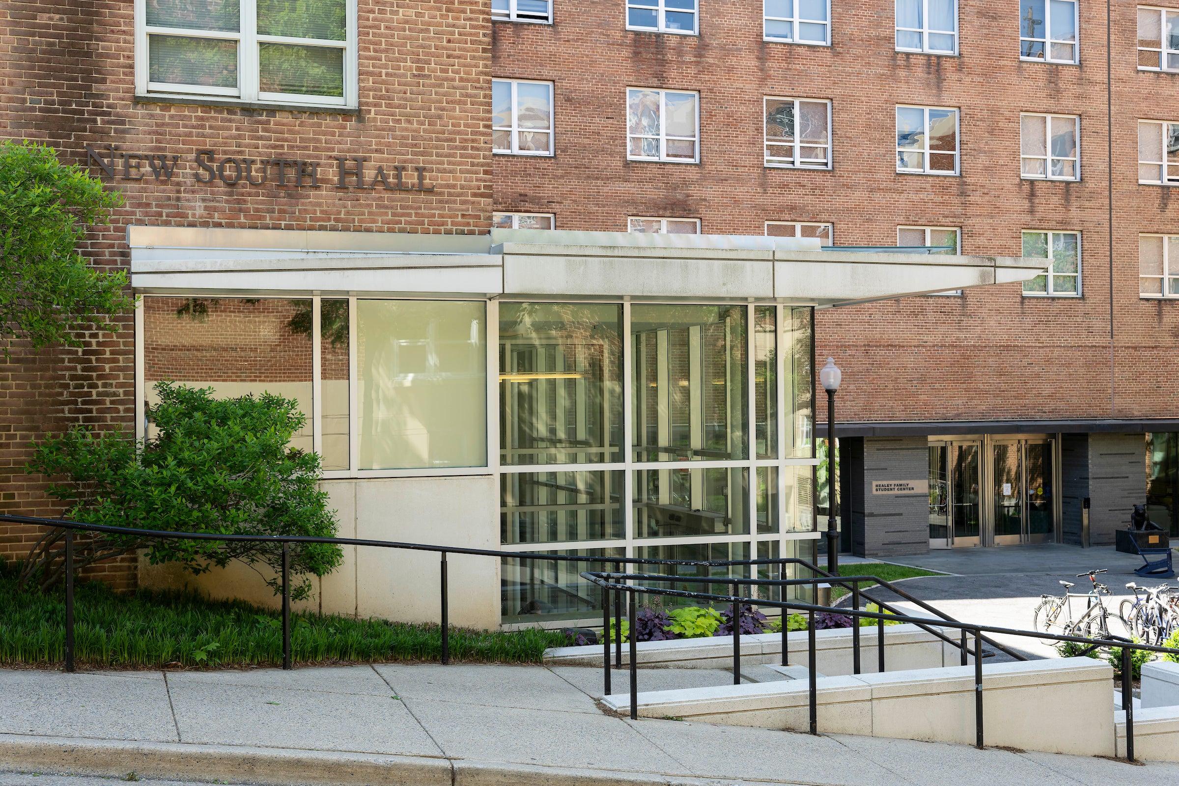 exterior of New South, a brick building with a glass entrance