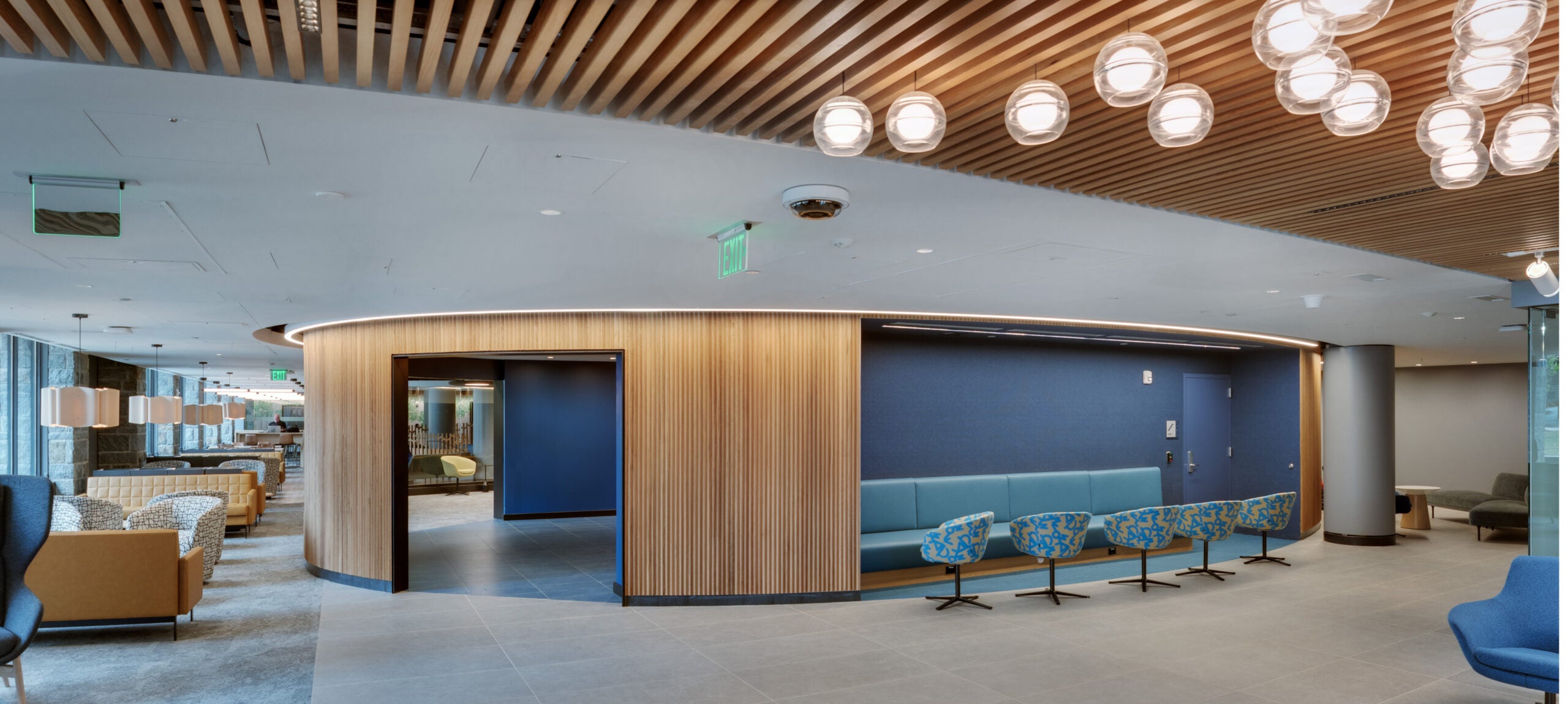 contemporary lobby with wood ceiling